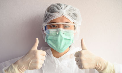 mnvs-masked-doctor-giving-thumbs-up-image